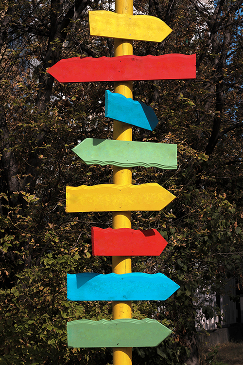 colorful-directional-arrows-on-signpost-2023-11-27-05-32-31-utc